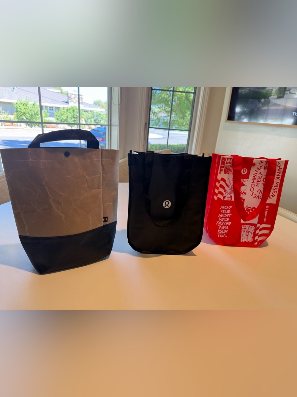 THREE LULULEMON SHOPPING BAGS